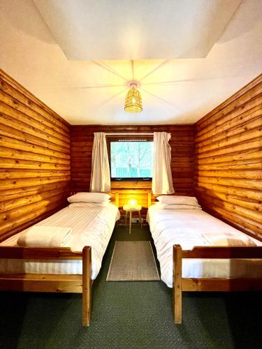 Riverside log cabins