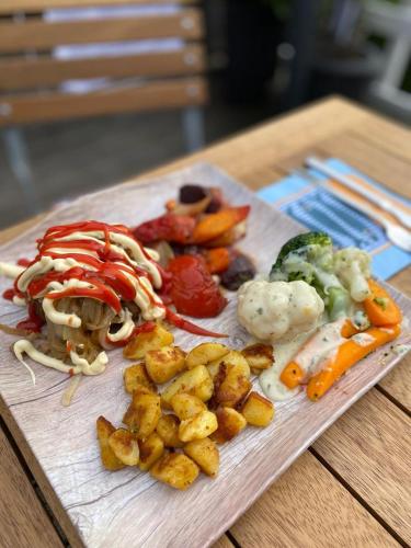 Restauracja, Bed & Breakfast Moments in Schagen