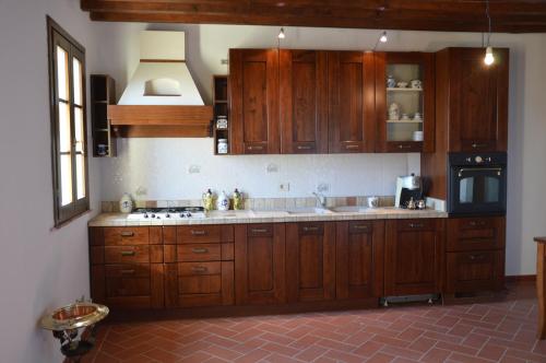 廚房, Agriturismo Corte Dainelli in 蒙塔伊奧內