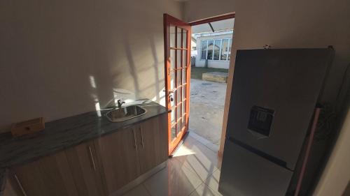 Kitchen, Cottage self catering unit with ensuite. in Kidd's Beach