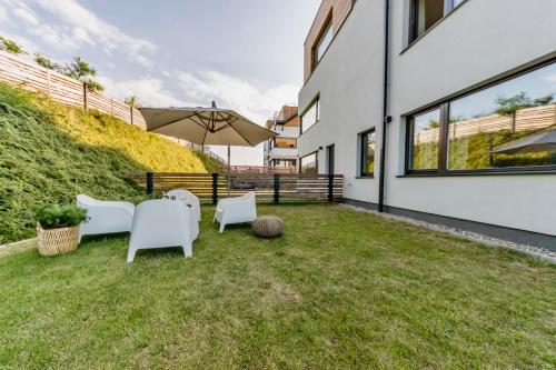Apartament nadmorski z ogródkiem
