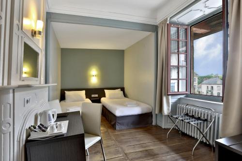 Chambre avec 2 lits