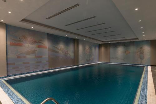 مسبح, فندق وجاردينو ريزيدنس (Gardino Hotel & Residence - Fanduq Jardino) in المعذر