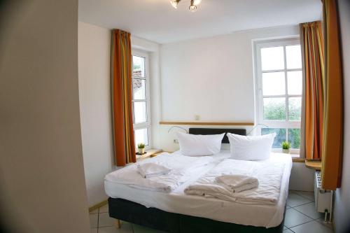 Haus Blick zur See Ferienwohnung 08 - mit Sauna- und Schwimmbadnutzung im AHOI Sellin, Гёрен (фото 8)