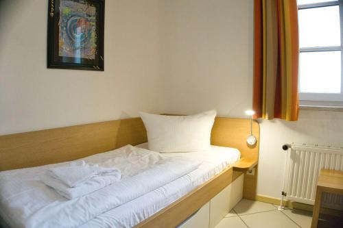 Haus Blick zur See Ferienwohnung 08 - mit Sauna- und Schwimmbadnutzung im AHOI Sellin, Гёрен (фото 10)