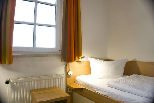 Haus Blick zur See Ferienwohnung 08 - mit Sauna- und Schwimmbadnutzung im AHOI Sellin, Гёрен (фото 11)