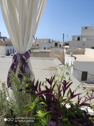 White cycladic town house with sea vew