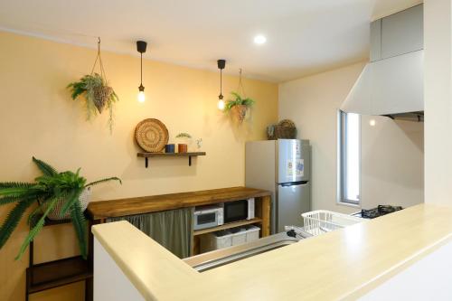 오키나와 본섬 コンドミニアム　MOTOBUさくらテラス (コンドミニアム　MOTOBUさくらテラス) 3성급 싱글룸 외관