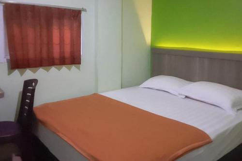 . Guest House Anak Raja Pangkalan Bun Syariah Mitra RedDoorz