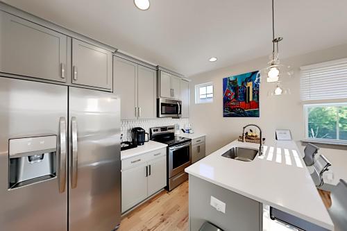 Sleek Nations Getaway Game Room & Walkable Locale townhouse - image 5