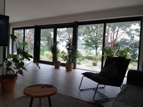 Vakantiehuis met hottub en barrelsauna in Buurtschap Giethmen