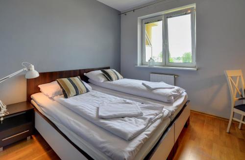 Lodz4u - Apartament Monopolis z garażem Bon Turystyczny - image 3