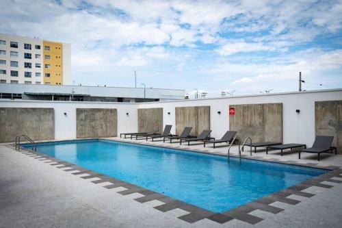 Lujoso y Comodo Departamento con playa 2 piscinas cancha de tenis jacuzzi seguridad 24 horas