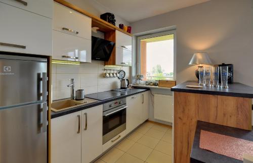 Lodz4u - Apartament Monopolis z garażem Bon Turystyczny - image 11