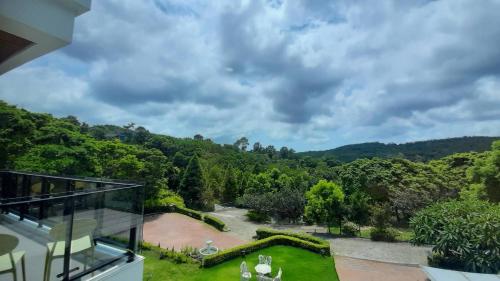 Balkon/terasa, 印象莊園包棟民宿,一日一組客人,依人數開房 in Okrožje Xihu