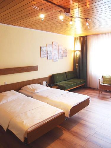 Hotel Garni Am Römerhof GmbH