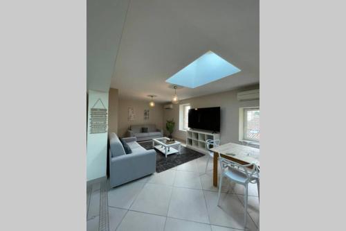 Koplietošanas atpūtas telpa ar TV, Superbe appartement avec 2 Chambres - 9 Personnes - Parking Privé (Superbe appartement avec 2 Chambres - 9 Personnes - Parking Prive) in Tain-l'Hermitage