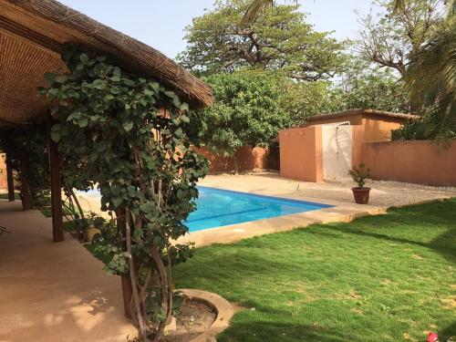 Zwembad, Villa de charme dans résidence de standing (Villa de charme dans residence de standing) in Nianing
