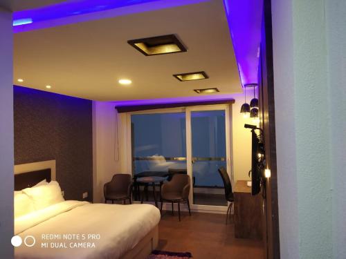 Habitación doble, deluxe, vista parcial al mar