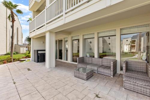 NEW LISTING! Ground floor with spacious patio! Steps to the beach and pool - image 4