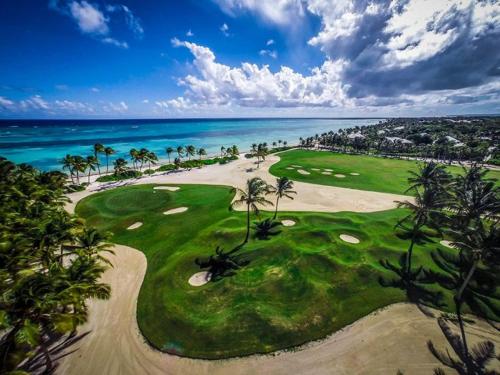Colorful golf-front villa with private pool in exclusive beach resort