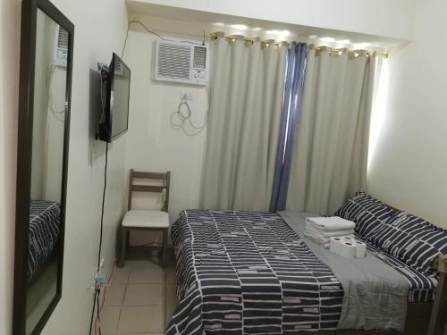 Mack's Awesome Place 24 with Netflix and FastUnliwifi, Manila (fotografie 3)