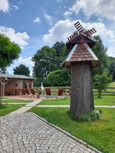Ferienhaus auf einer Ebene mit eigenem Garten, Sommerpool und Badefass in Heinsdorfergrund, Deutschland