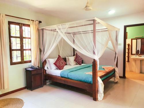 FLAME TREE COTTAGES