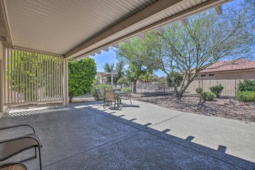 Inviting Surprise Home with Covered Patio Near Golf