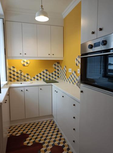 ห้องครัว, Apartamentos Ázera - Lígia Ázera (Apartamentos Azera - Ligia Azera) in ปรายา ดา วิตอเรีย