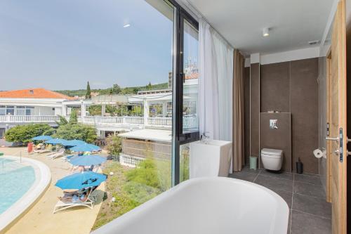 Hotel Millenium deluxe Room Type - Superior Double or Twin Room with Pool View