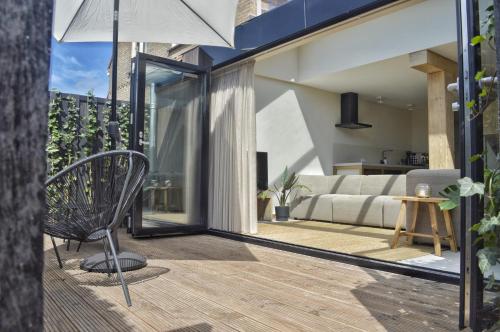 balkon/taras, Van Heeckeren Apartments & Suites Buren in Ameland