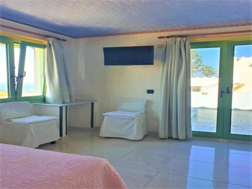 Room in Studio - Gorgeous Studio for 2 people, Swimming Pool and Sea View chambre d'hôte Sorós Kharasoú