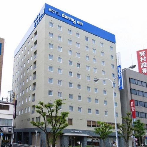 a large building with a large clock on the front of it, Natural Hot Spring Spa Dormy Inn Tsu in Tsu