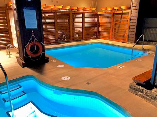 1BR + Loft | Tyndall Stone Lodge | Village Location | Pool & Hot Tub | Private Balcony - image 4