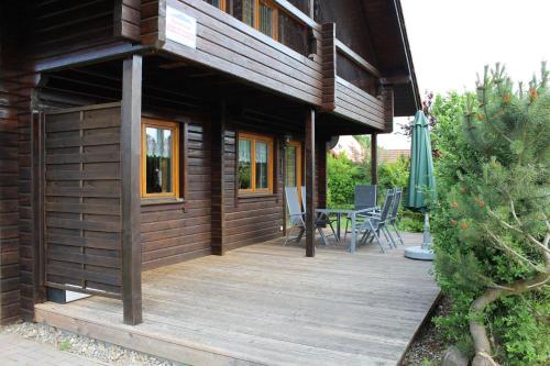 Holzblockhaus mit Kamin am Kite , Surf und Badestrand