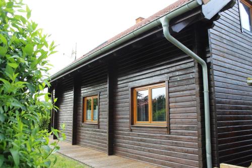 Holzblockhaus mit Kamin am Kite , Surf und Badestrand