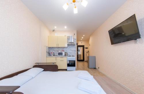 Уютная Студия OrangeApartments24 в центре города Королев!