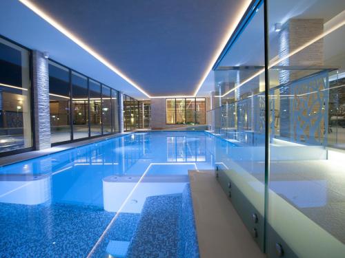 Swimmingpool, Hotel Europeo Alpine Charme & Wellness in Pinzolo