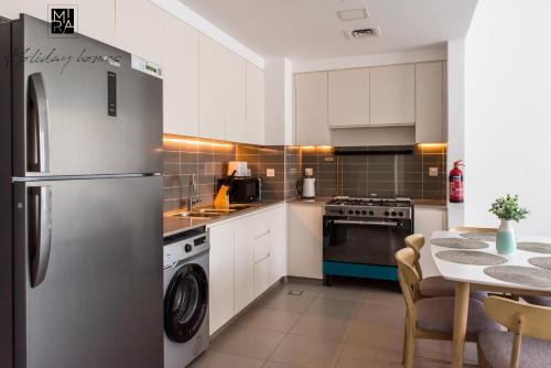 Mira Holiday Homes - 2 bedroom Hayat Boulevard in Townsquare - Great Family Activities, Dubai (Foto 8)