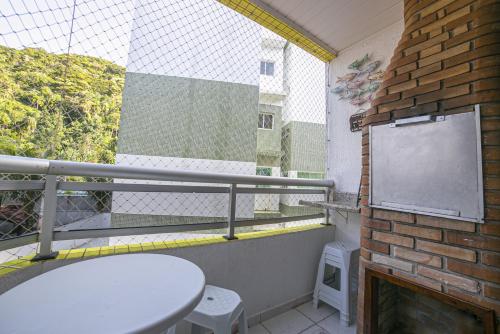 Apto 22E ar condicionado e ventilador, 2 quartos, churrasqueira, elevador e piscina