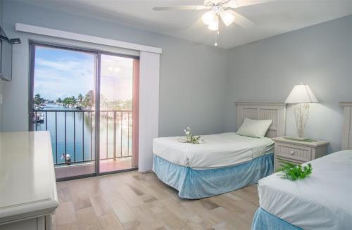 Rose All Day 2bed 2bath with dockage Cabana Club and Inch Beach access - image 5