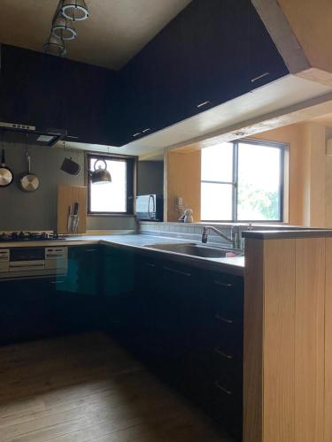Kitchen, ゲストハウスよるよなか in Nagoya