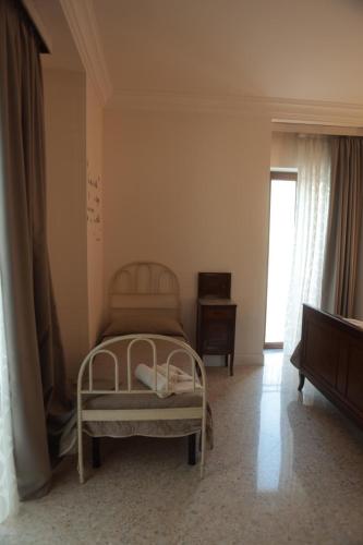 Villa Alemi' Room Type - Triple Room with Garden View