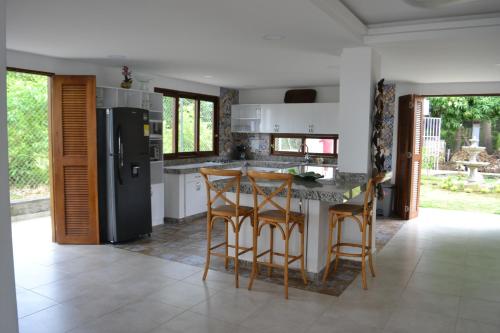 廚房, 亞特蘭蒂斯民宿 (Condominio Atlantis) in 科偉尼亞斯