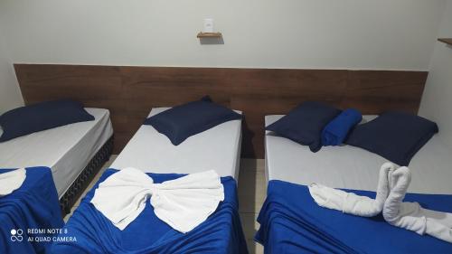 Pousada Quarto com frigobar,ar e garagem gratuita - Bosque do Imperador