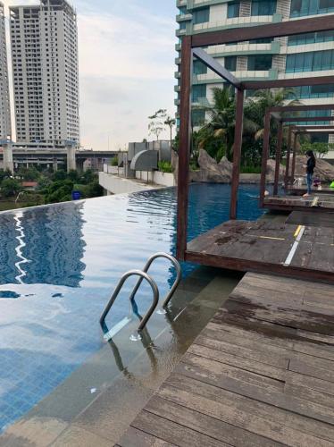 Swimming pool, ROOM IN Cozy Grand Kamala Lagoon in Bekasi