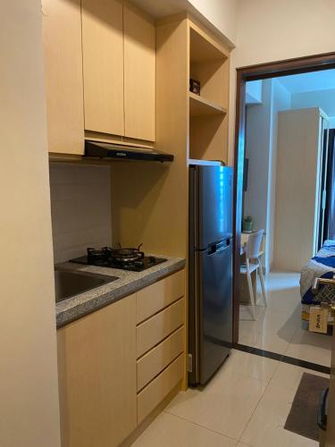 Kitchen, ROOM IN Cozy Grand Kamala Lagoon in Bekasi