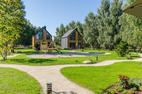 Viesnīcas āriene, Domki w Naturze in Lubiatowo
