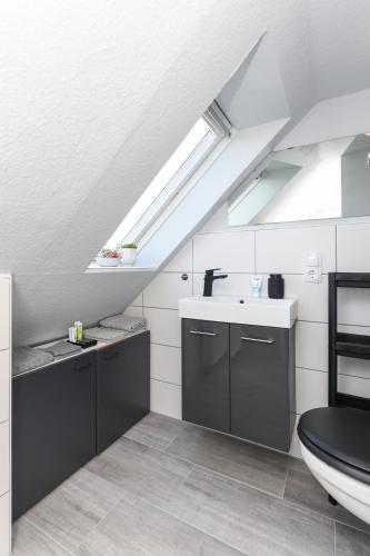 Kamar Mandi, Ferienwohnung Abendrot im Haus Auszeit Crusoh in Helgoland